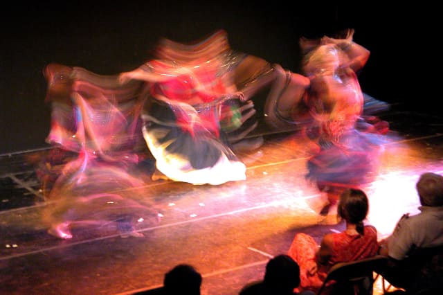 Dancing Gypsies, a portrait photograph by Bob McNeil