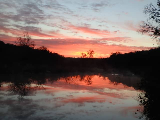 Sun 03, a sunrise and sunset photograph by Bob McNeil
