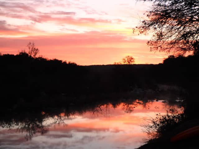 Sun 05, a sunrise and sunset photograph by Bob McNeil