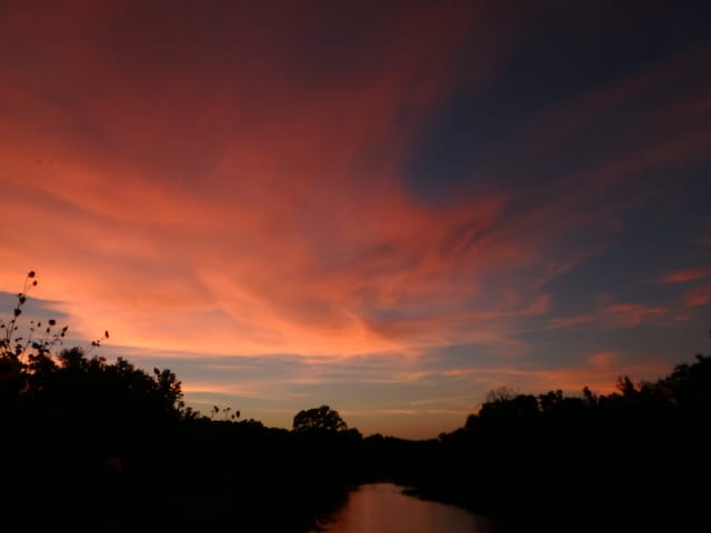 Sun 08, a sunrise and sunset photograph by Bob McNeil