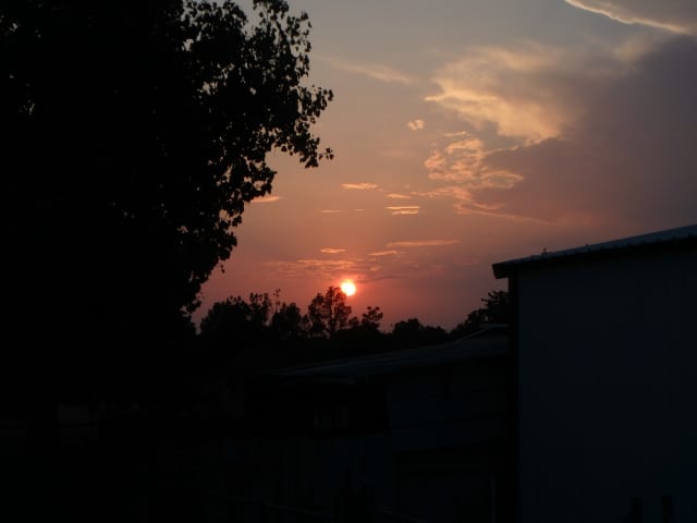Sun 09, a sunrise and sunset photograph by Bob McNeil