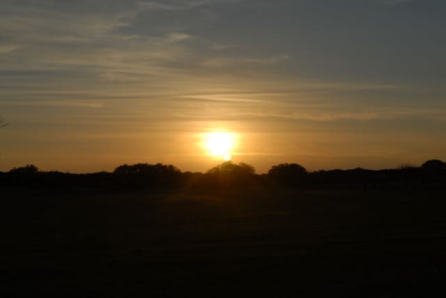 Sun 13, a sunrise and sunset photograph by Bob McNeil