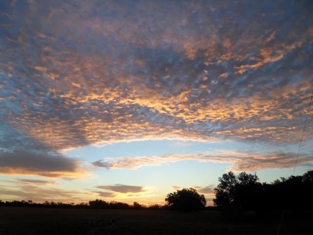 Sun 15, a sunrise and sunset photograph by Bob McNeil