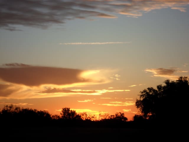Sun 16, a sunrise and sunset photograph by Bob McNeil