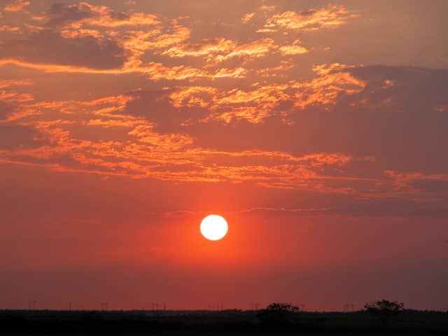 Sun 17, a sunrise and sunset photograph by Bob McNeil