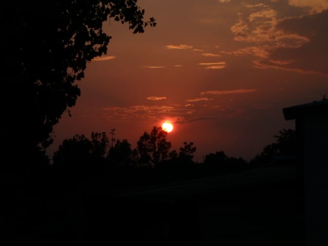 Sun 23, a sunrise and sunset photograph by Bob McNeil