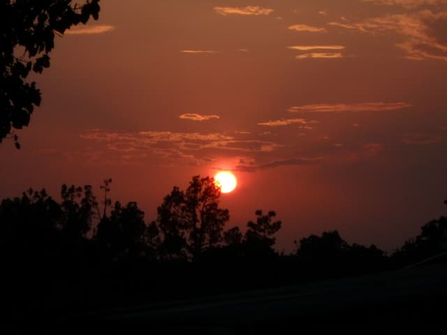 Sun 24, a sunrise and sunset photograph by Bob McNeil