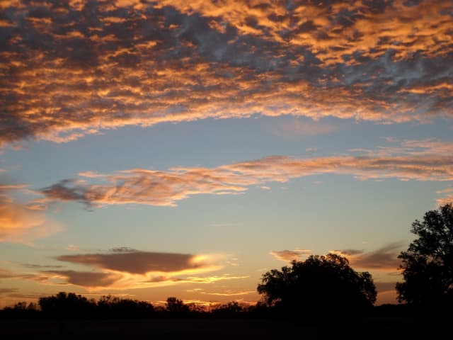 Sun 26, a sunrise and sunset photograph by Bob McNeil